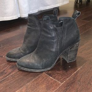 Distressed black pull on ankle booties